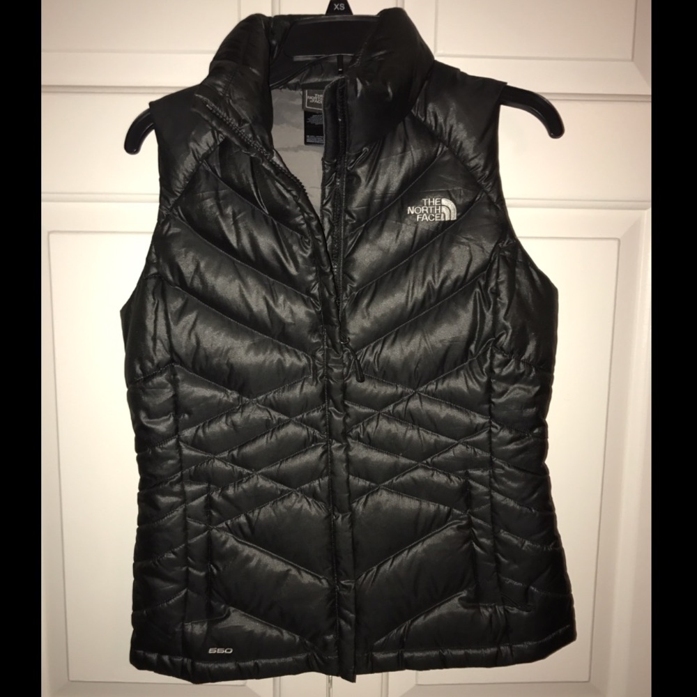 Black North Face Puffy Vest (size small)