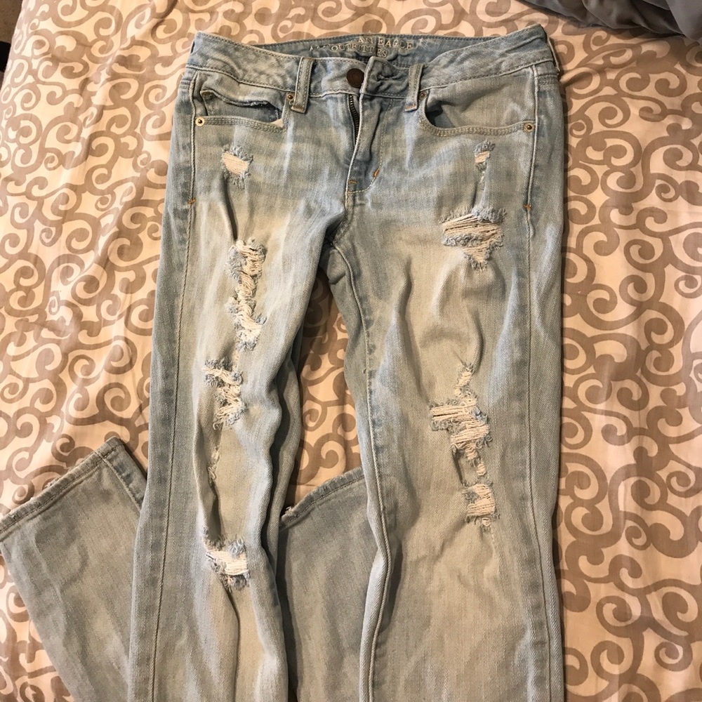 Light wash distressed skinny jeans