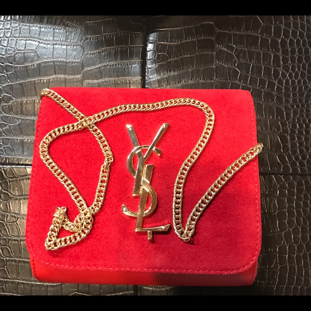 Red clutch with gold chain