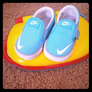 Blue Nike slip on sneakers NWOT