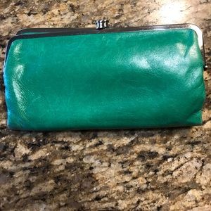 Peacock green hobo wallet.