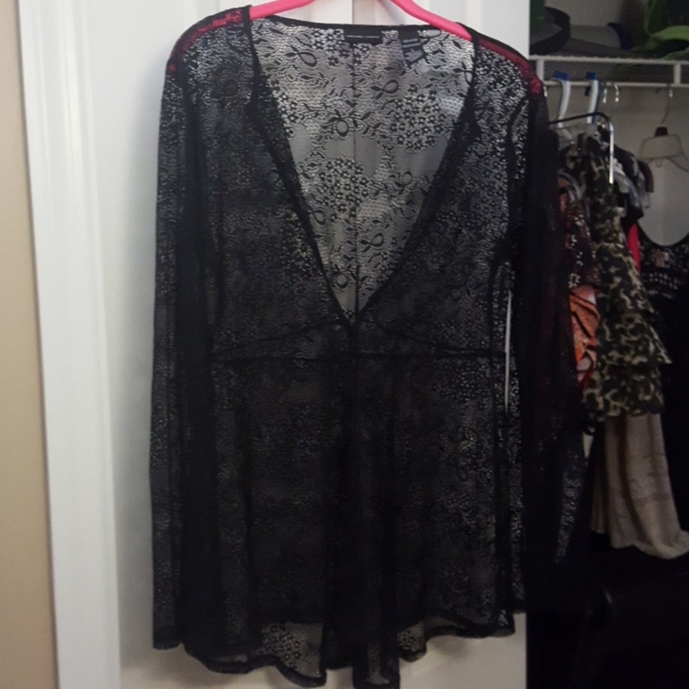 Lace patterned sheer tunic.