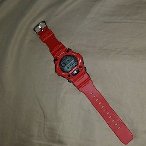 Red and white G-shock sports watch.