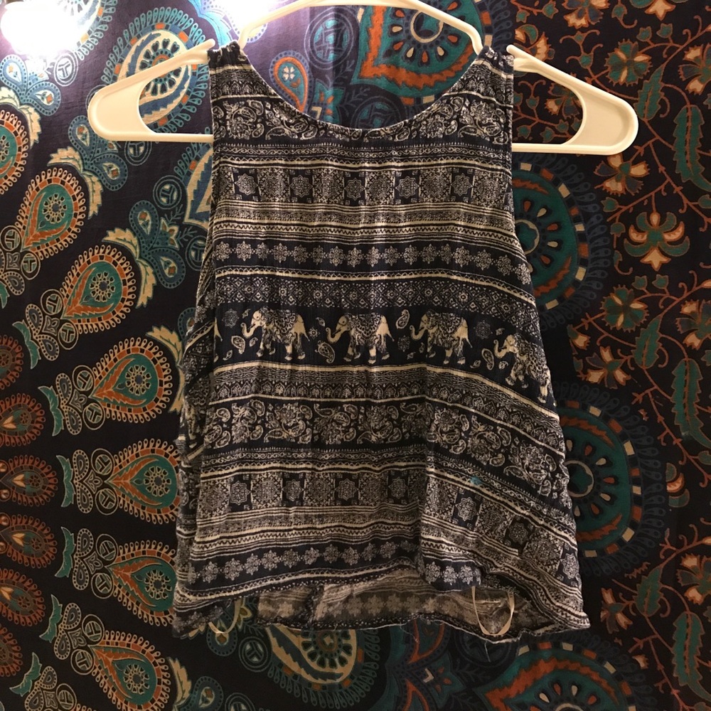 A Blue and white elephant pattern shirt