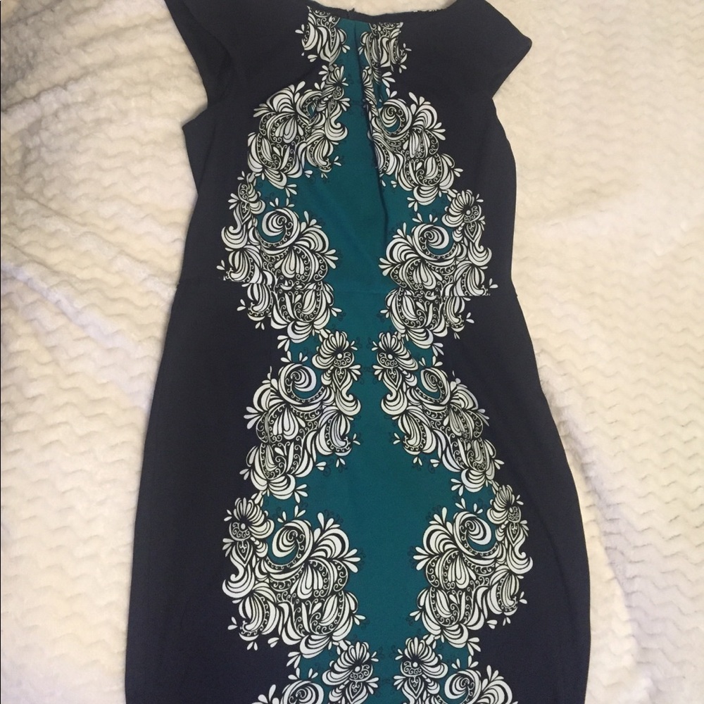 Elegant dress worn one time for a wedding.