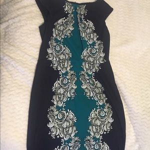 Elegant dress worn one time for a wedding.