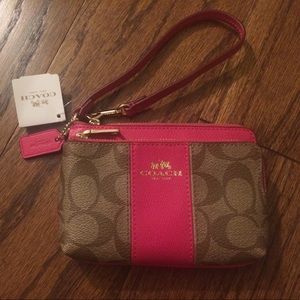 A Coach wristlet