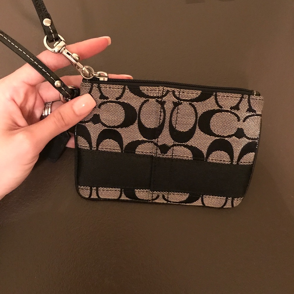 Black coat wristlet brand new