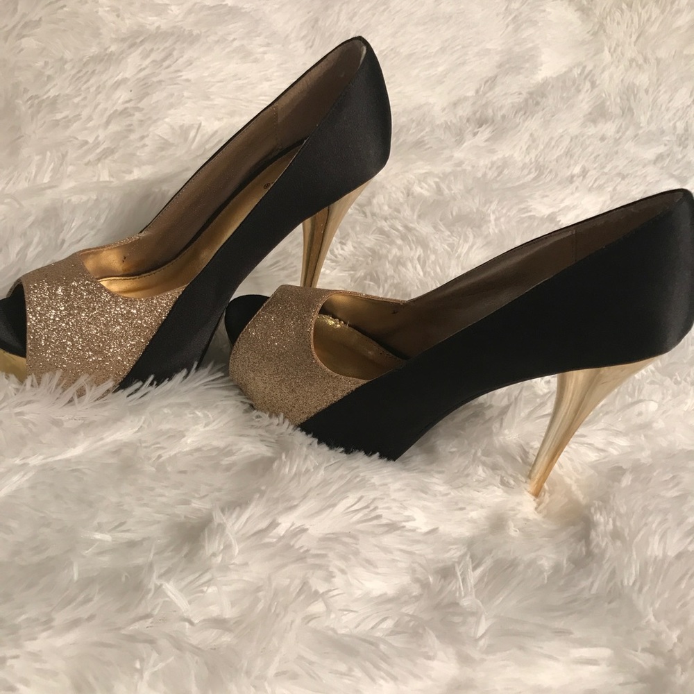 Black and gold heels