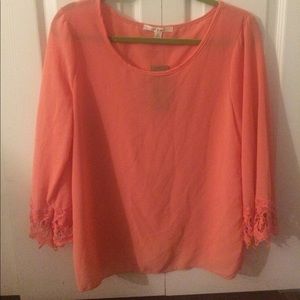 Coral color crocheted bell sleeve top