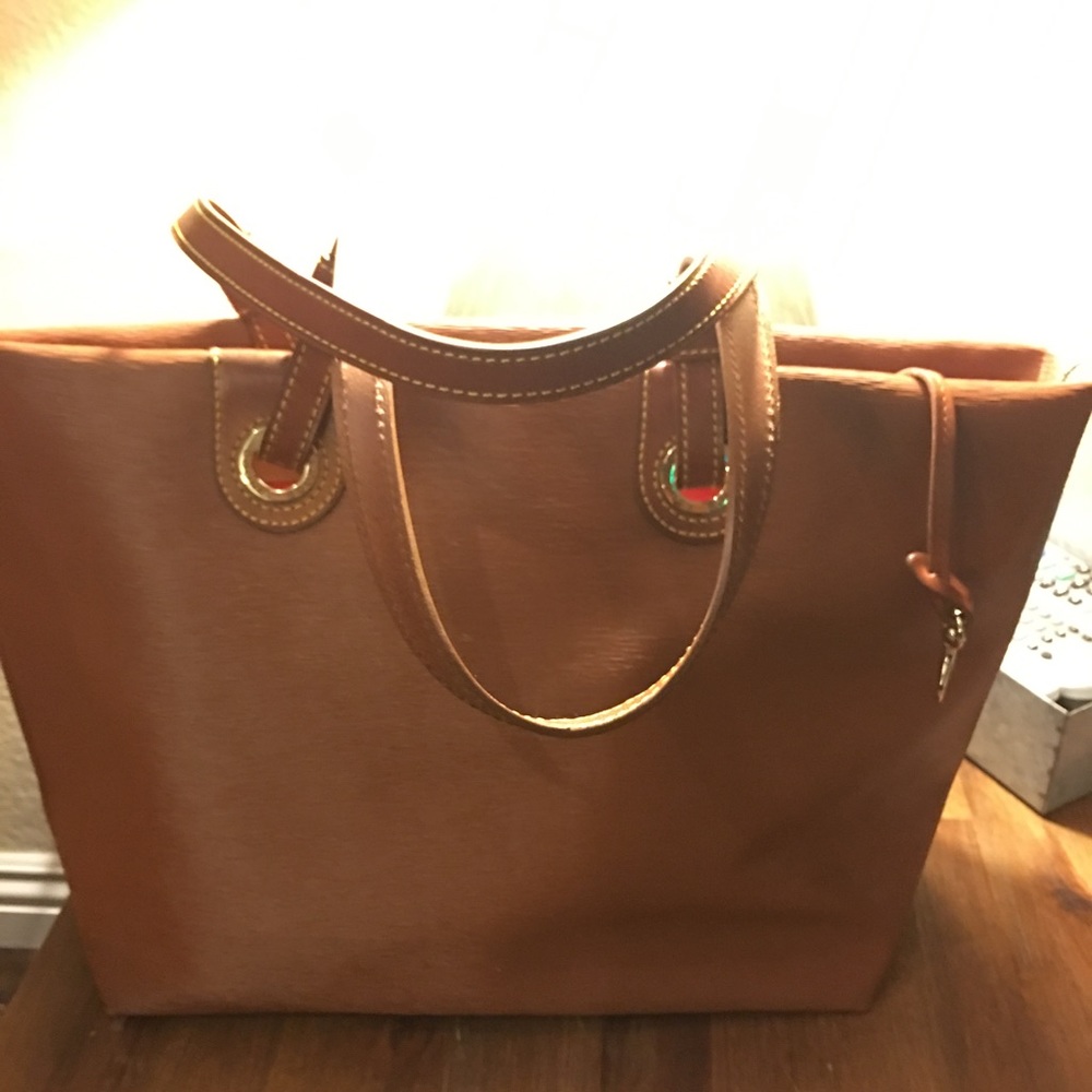 1 day sale! Dooney & Bourke wavy leather grommet