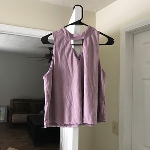 Purple halter shirt. Buttons at back of neck