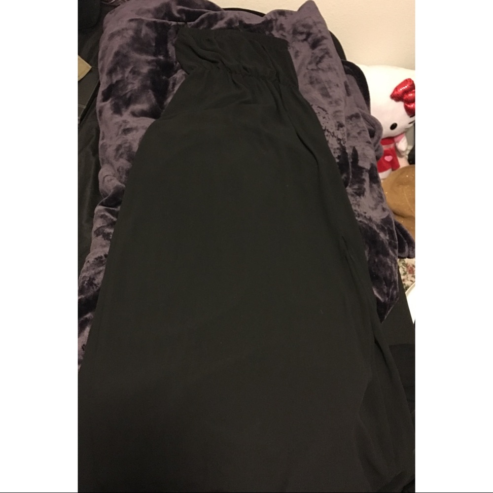 Black tubetop maxi dress.