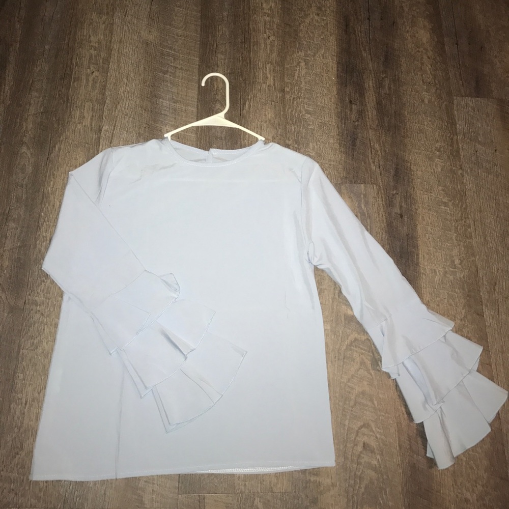 Women's light blue blouse.