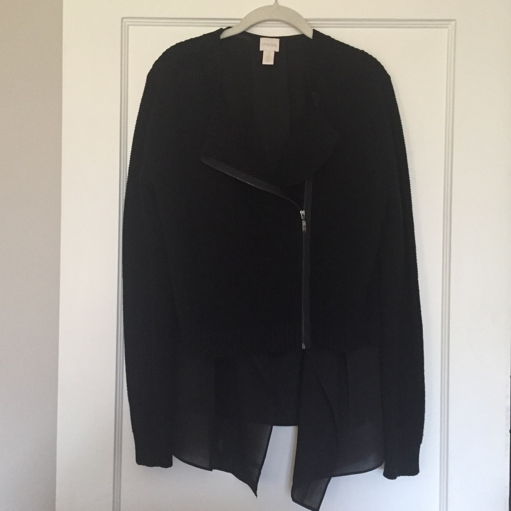 Sweater with flowing underlay.