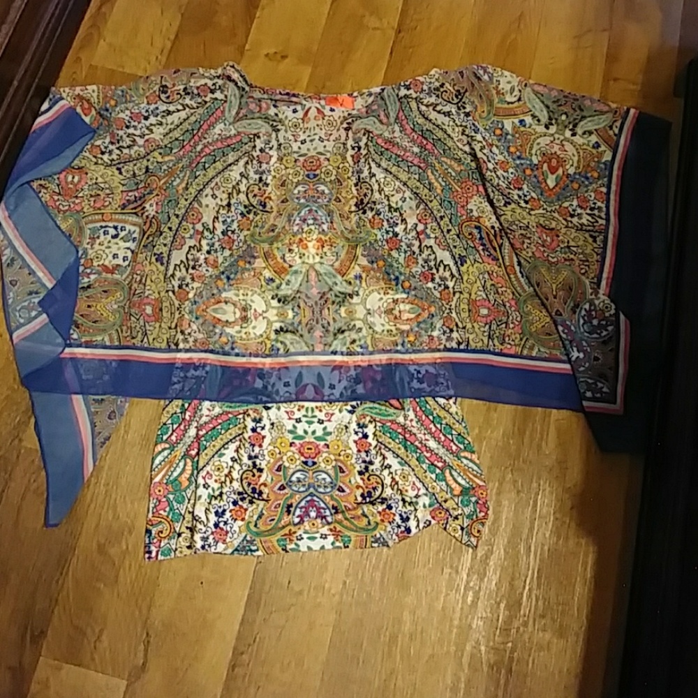 Colorful floral print batwing blouse.