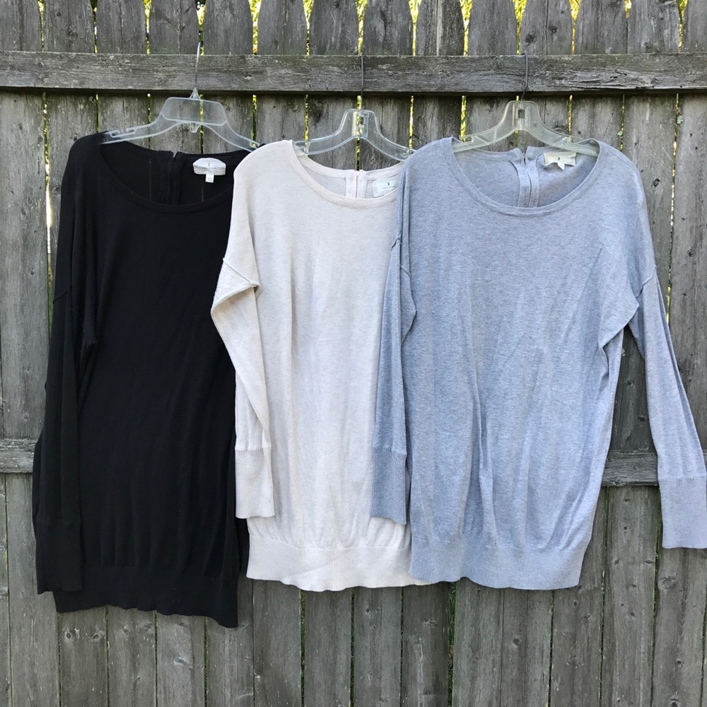 Three zipper back sweaters sized Large