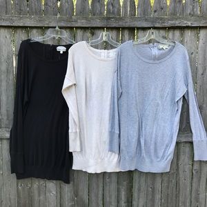 Three zipper back sweaters sized Large