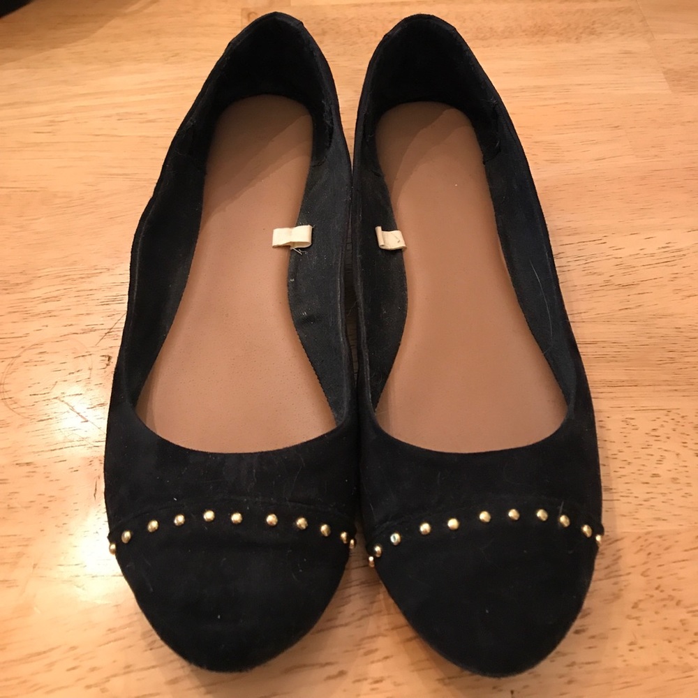 Black flats with gold stud accents!
