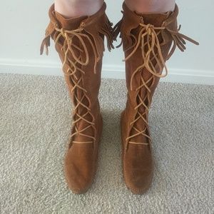 Tan leather moccasin boots