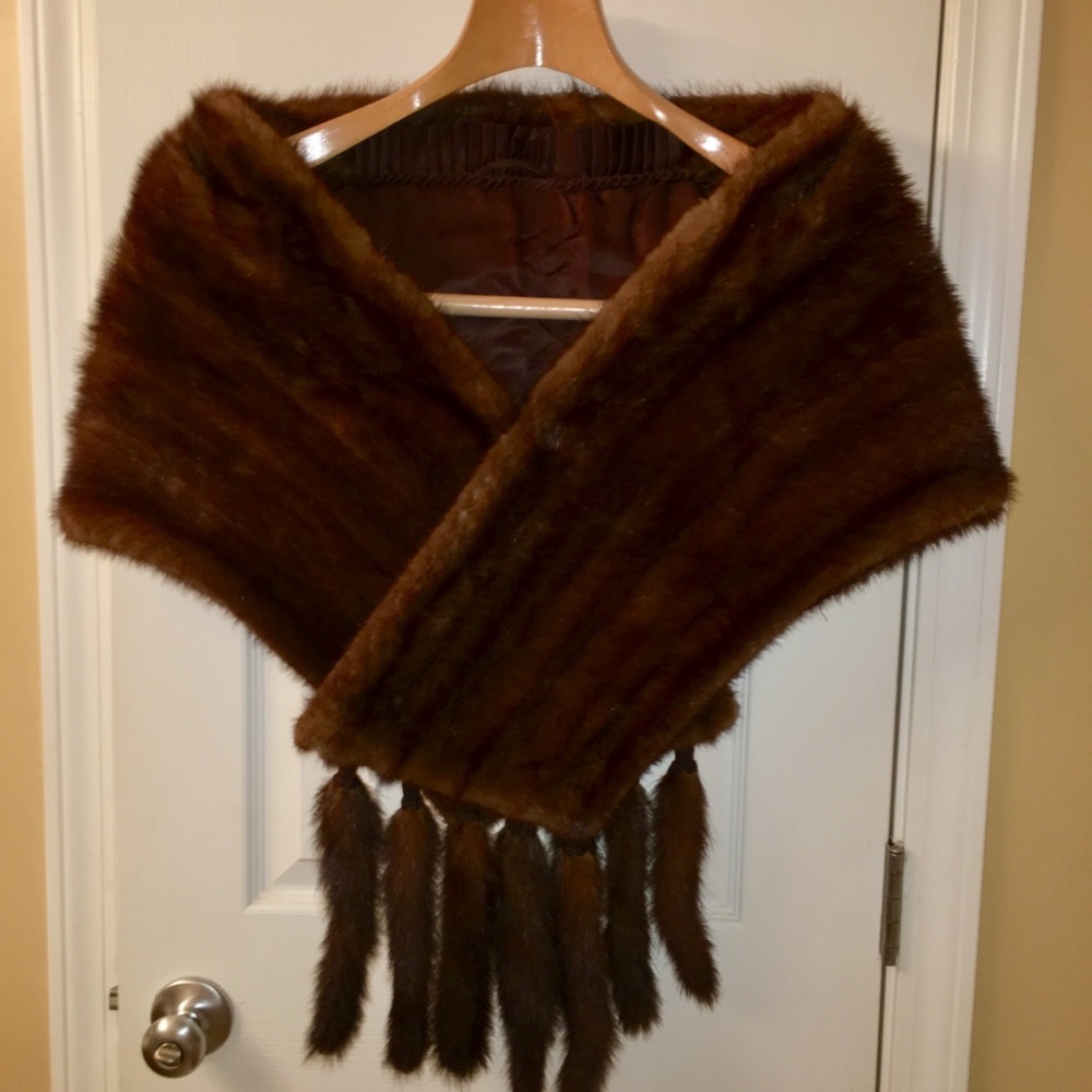Mink stole with detachable tails.