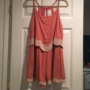 Burnt red/orange romper with scalloped trim