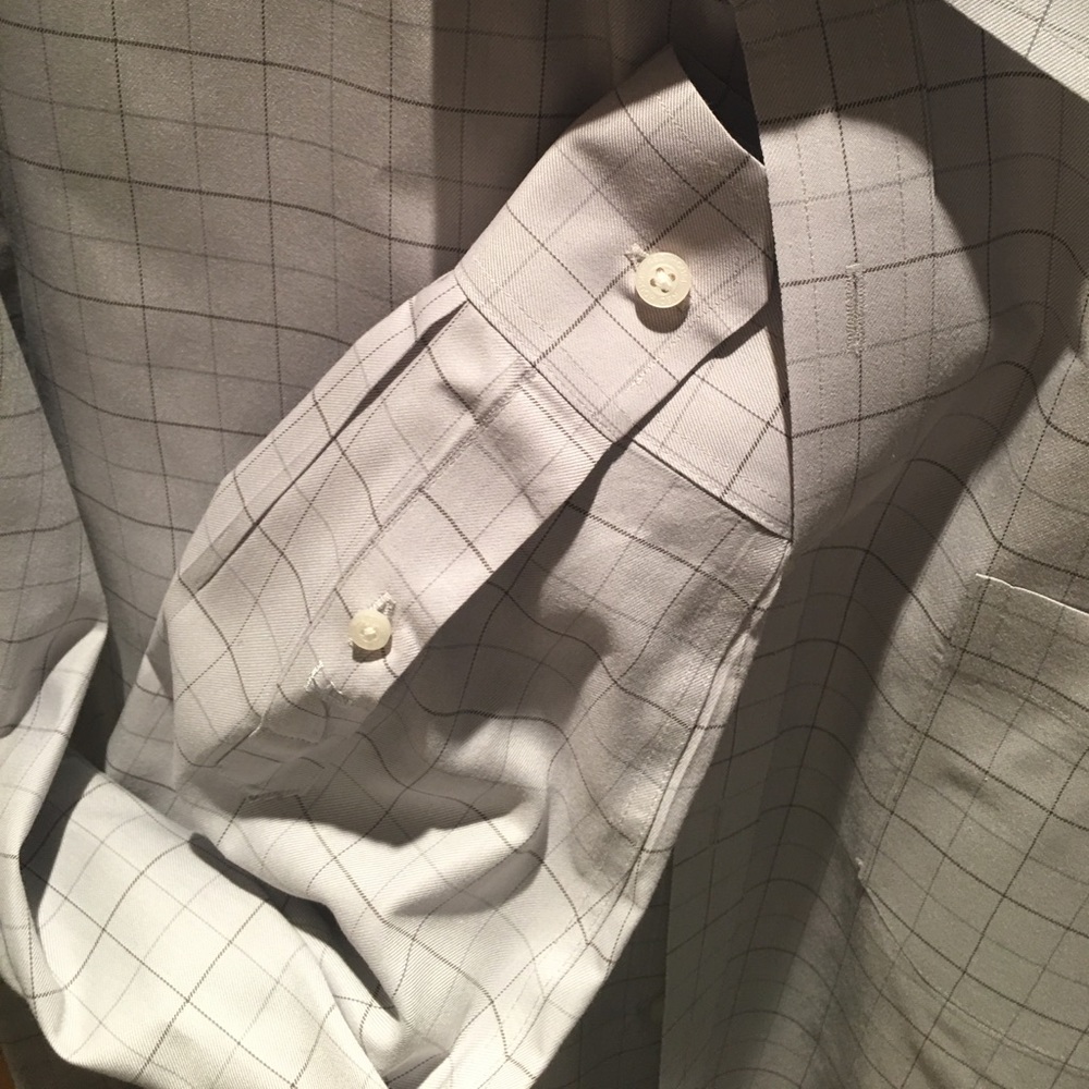 Plaid men's dress shirt with wing collar.