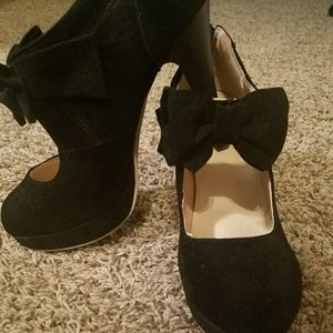Black suede heels that have never been worn