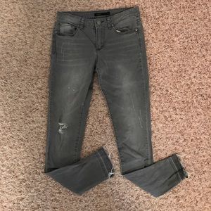 Dark grey fringe bottom jeans