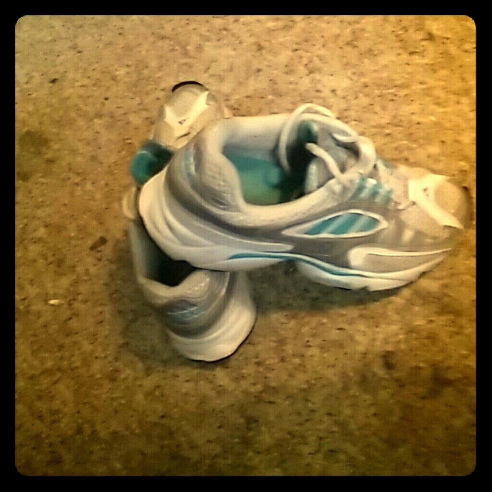 A pair of sneakers (tennis-shoes)