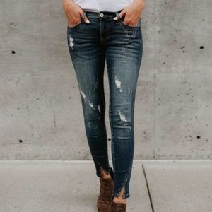 Destructed split ankle skinny jeans
