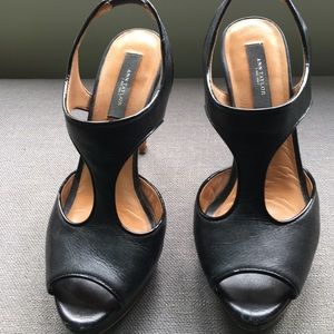 Black leather T strap heeled sandals