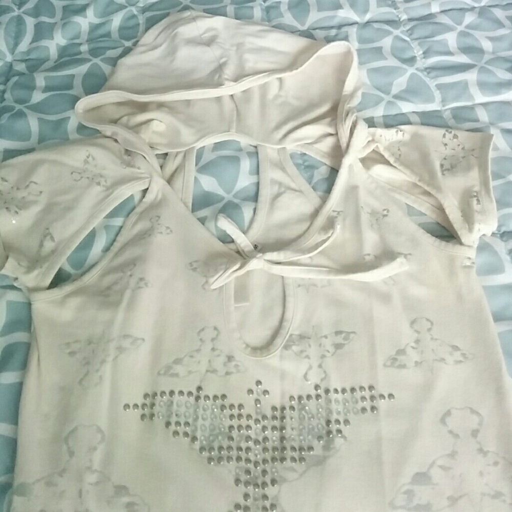 Cut out top with a hoodie.