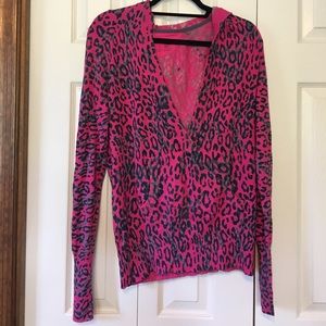 Cheetah print sweater with a pocket and hood