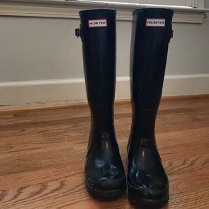 Black glossy tall hunter boots