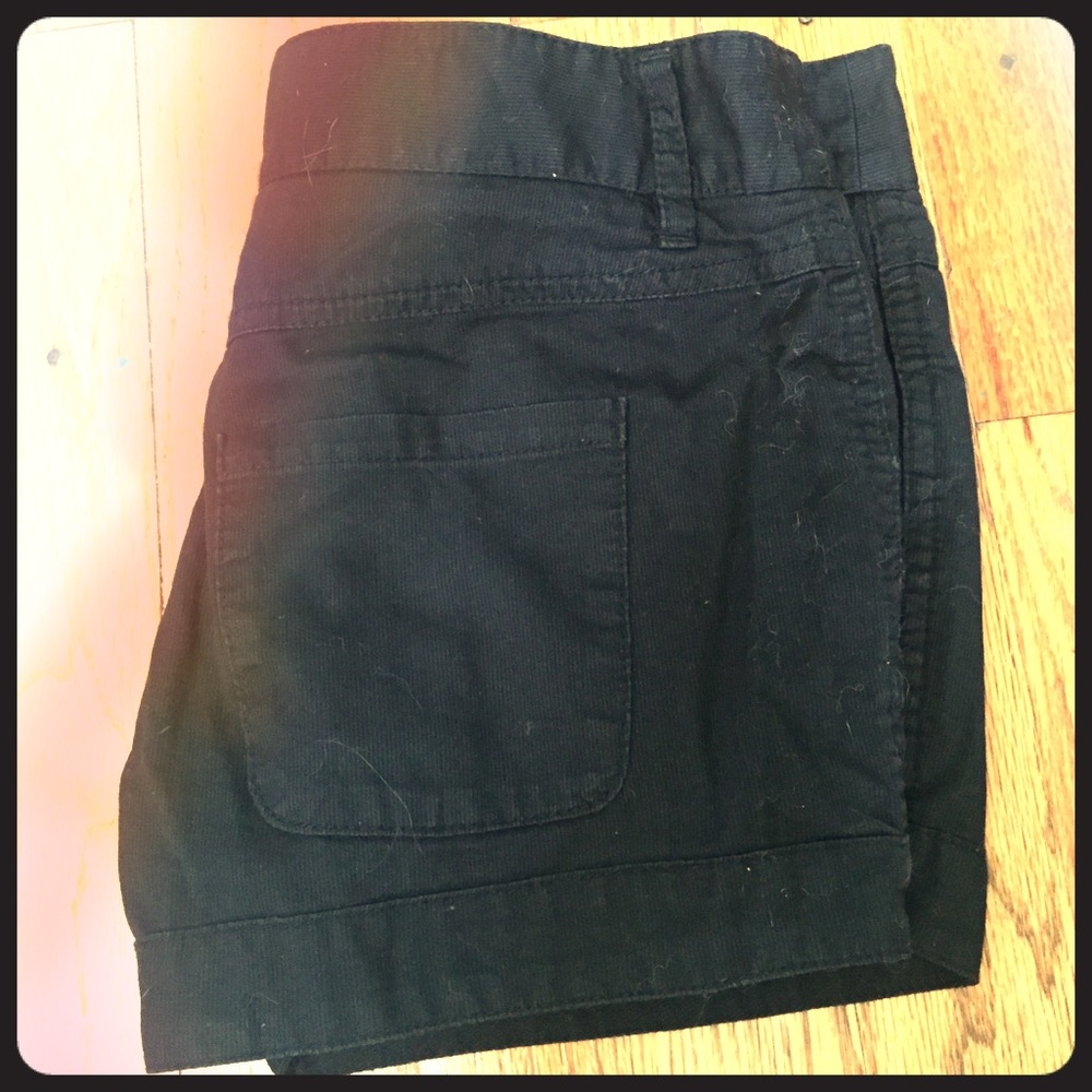 Black button shorts