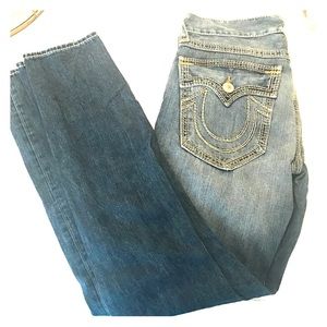 Men's True Religion distressed jeans.