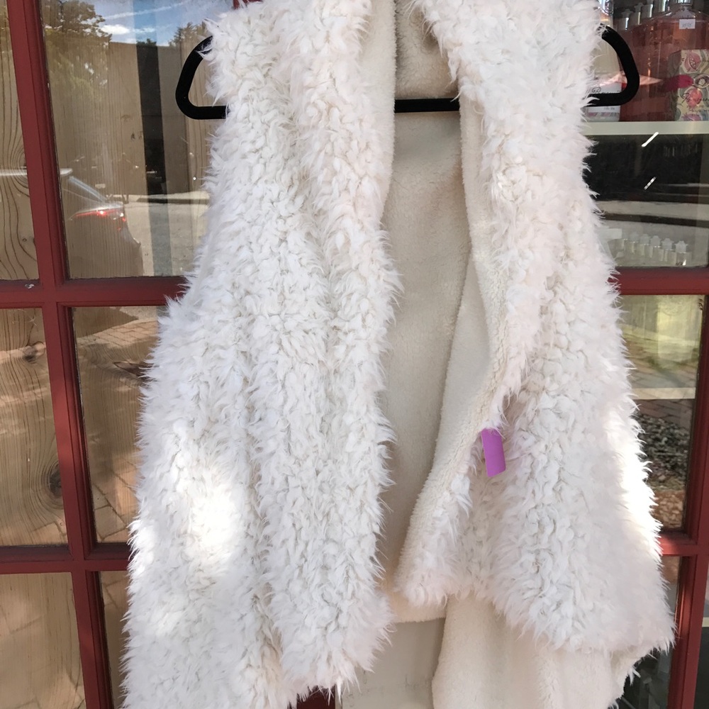 Reversible sheep like vest.  Coming back in…