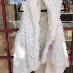 Reversible sheep like vest.  Coming back in…