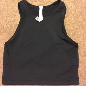 Lululemon black crop top with mesh detail size 4