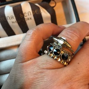4 stackable gold toned rings with stones 4 stackable gold toned rings with stones