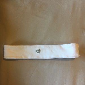 White Lulu Lemon headband. Slightly worn