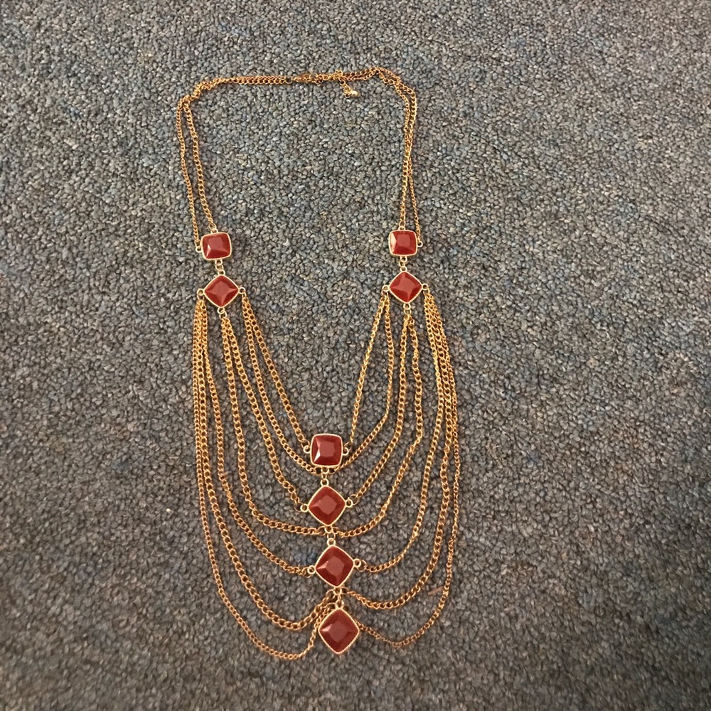 Boutique fashion necklace. Color Gold/burgundy