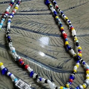 Me+We red, blue, yellow, white bead necklace