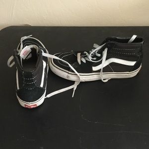 Black leather/cloth vans high tops women's size 8 Black leather/cloth vans high tops women's size 8