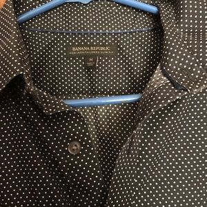 Black polka dot white button down shirt.