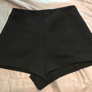 Black and hot pink high waisted shorts