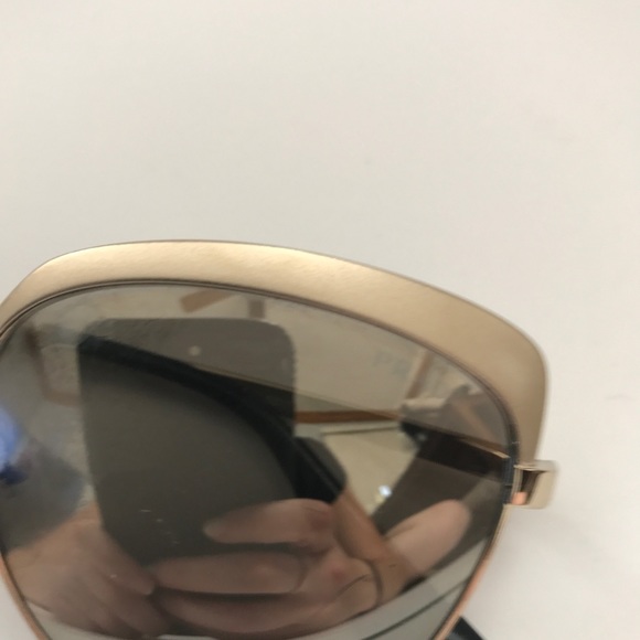 Prada 51TS 56 Gold sunglasses