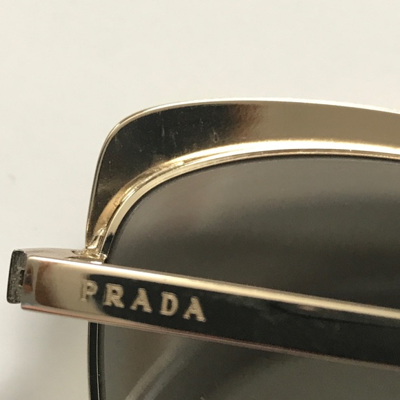 Prada 51TS 56 Gold sunglasses