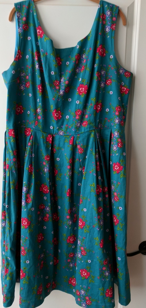 Vintage style dress with pleats.